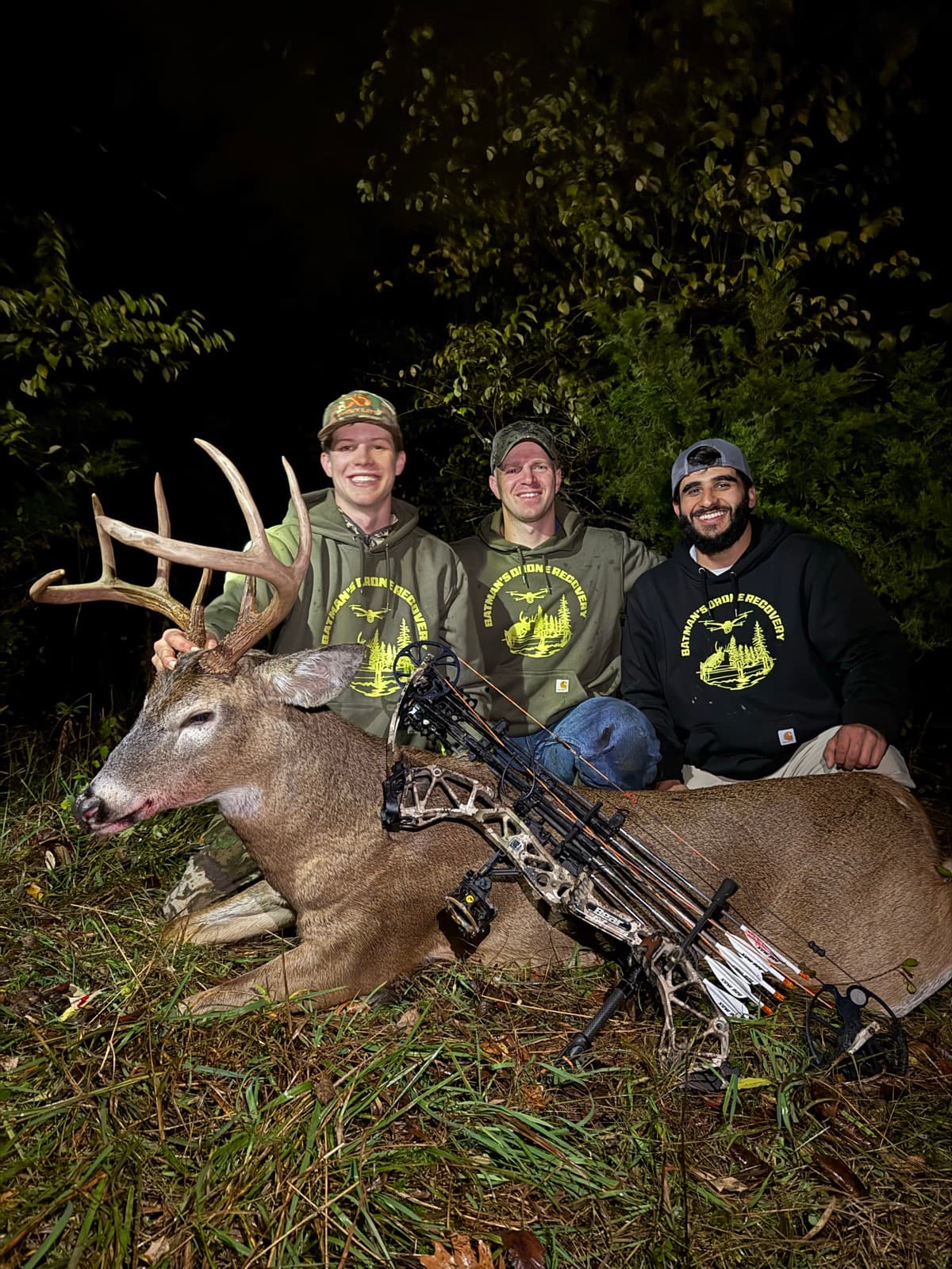 The Batman's Drone Recovery crew with a recovered buck and bow after a night search